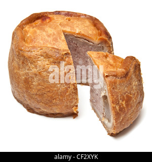 Melton Mowbray pork pie isolated on a white background studio. Banque D'Images