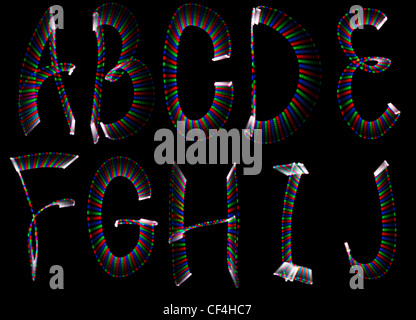 Lettres arc-en-ciel lumineux, une partie de l'alphabet sur fond noir. Isolées. Banque D'Images