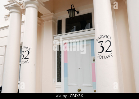 Une élégante maison en stuc dans Warwick Square. Banque D'Images
