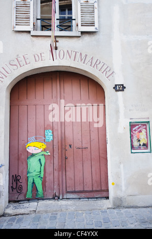 Paris, France. L'entrée du musée de Montmartre Montmartre (Musée d'histoire culturelle). Petite île est peint sur la porte Banque D'Images