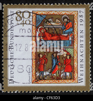 Allemagne - circa 1987:un voeux de Noël de timbres en l'Allemagne montre la naissance de Jésus Christ, l'Adoration des bergers, Banque D'Images