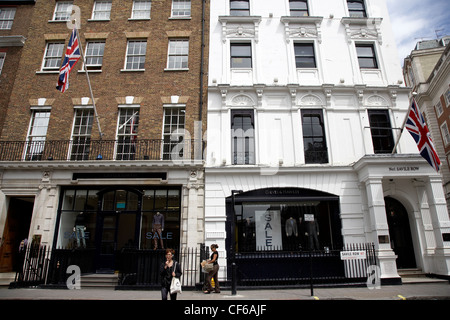 Vue extérieure de prestige shop fronts dans Saville Row. Banque D'Images