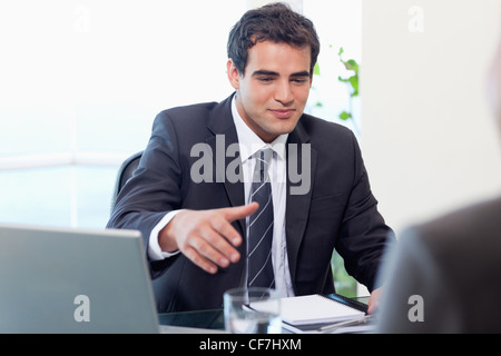 Businessman giving his Hand Banque D'Images