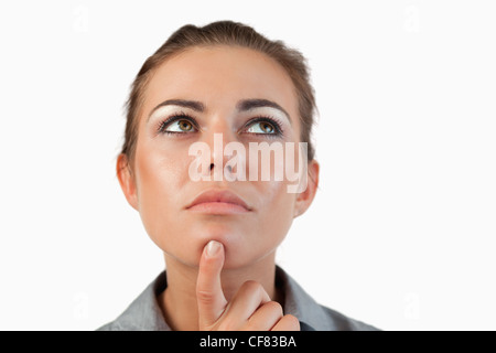 Close up of businesswoman perdue dans ses pensées Banque D'Images