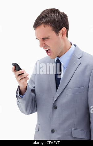 Businessman yelling at son portable Banque D'Images