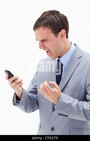 Angry businessman yelling at son portable Banque D'Images