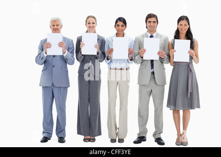 L'équipe d'affaires tenu cinq plaques Banque D'Images