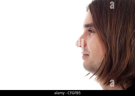 Profil de jeune homme aux cheveux long sourire neutre, visage détendu isolé sur fond blanc avec copie grand espace. Banque D'Images