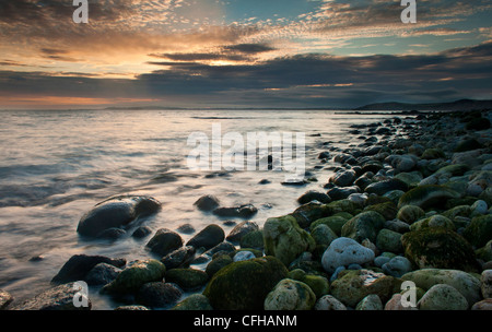 Osmington Mills sur la côte jurassique au coucher du soleil. Banque D'Images