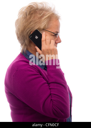 Vue de profil de femme parlant au téléphone mobile iPhone Banque D'Images