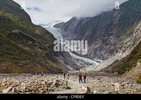 L'approche de touristes de terminal de Franz Josef Glacier, côte ouest, Nouvelle-Zélande Banque D'Images