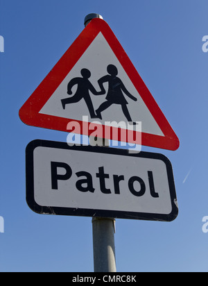 Patrouille crossing street sign Banque D'Images