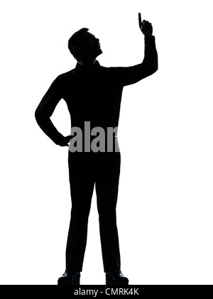 Un homme d'affaires caucasiennes jusqu'poiting heureux silhouette debout toute la longueur en studio isolé sur fond blanc Banque D'Images