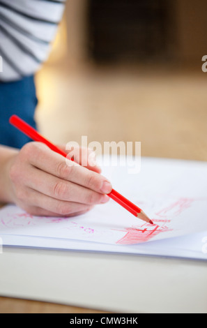 Fille sur papier Banque D'Images