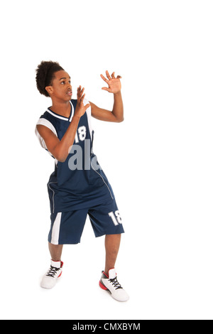 Joueur de basket-ball Noir debout dans le studio Banque D'Images