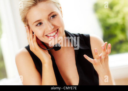 Girl in call center Banque D'Images