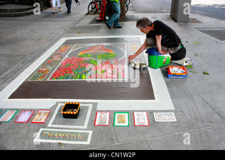 Artiste peintre de rue la peinture dans les rues de Dublin Banque D'Images