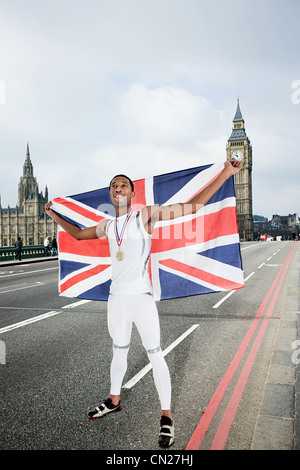 Le médaillé d'or olympique avec l'Union Jack Banque D'Images