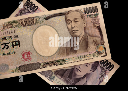 Gros plan de la face de 10 000 yen japonais et 5 000 notes. Banque D'Images