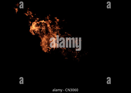 Flamme de feu isolé sur real photo - noir Banque D'Images