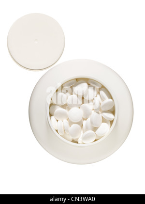 Comprimés blancs dans le récipient Banque D'Images