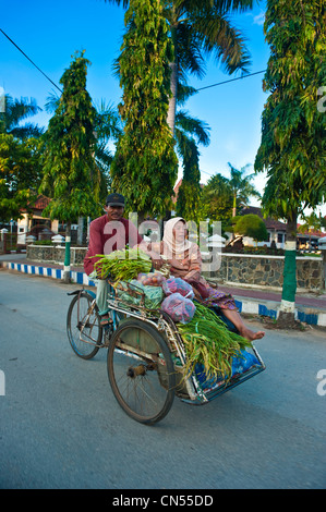 L'Indonésie, Java, Java oriental, Province de l'île de Madura, Sumenep, rikshaw Banque D'Images