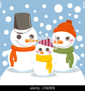 Le Snowman family smiling outdoors en hiver alors que la neige tombe Banque D'Images