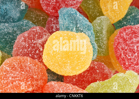 Assortiment de pâtes de fruits aromatisées en forme et contexte Banque D'Images