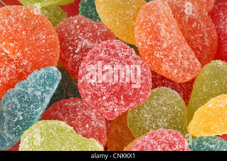 Assortiment de pâtes de fruits aromatisées en forme et contexte Banque D'Images