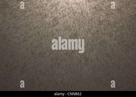 Feuille de papier gris qui a éclairé par derrière Banque D'Images