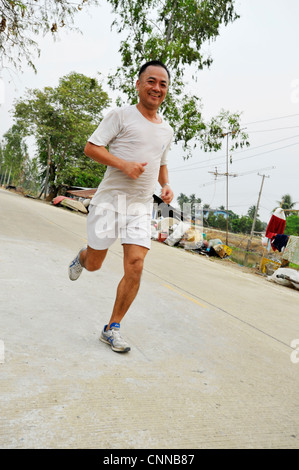 Hash House Harriers ou porteur de hachage, les membres de l'exécuter sur un hashers bangkok à Bangkok, Thaïlande Banque D'Images