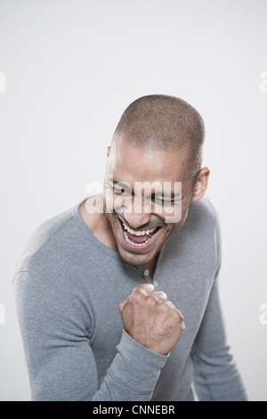 Portrait of Man Cheering Banque D'Images