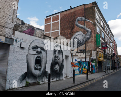 Street art par les artistes Ben lent et Roa dans Hanbury Street, à côté de Brick Lane, Londres, Angleterre Banque D'Images