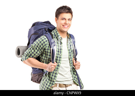 Un portrait d'un randonneur avec sac à dos posant isolé sur fond blanc Banque D'Images