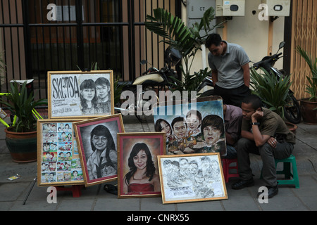 Peintre de portrait de la rue dans le vieux Batavia à Jakarta, Indonésie. Banque D'Images