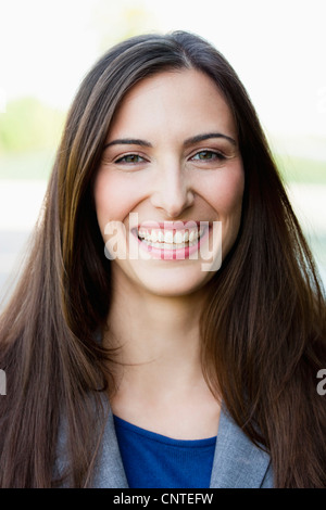 Close up de businesswomans smiling face Banque D'Images