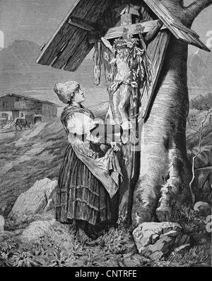 Femme en face d'un calvaire dans les Alpes, historique gravure sur bois, vers 1870 Banque D'Images