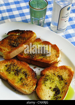 La cuisine grecque. Le pain grillé avec de l'huile d'olive et l'origan Meze Banque D'Images