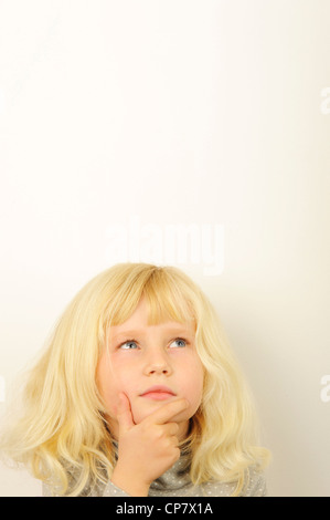 Stock Photo de la pensée de l'enfant Banque D'Images