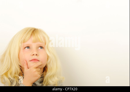 Stock Photo de la pensée de l'enfant. Banque D'Images