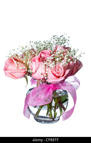 Belles roses en vase en verre sur fond blanc, pur Banque D'Images