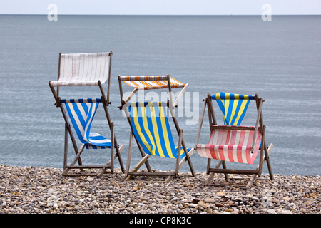 Transats blowing in wind on beach Banque D'Images