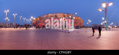 Stade olympique de Beijing Birds Nest au crépuscule Banque D'Images