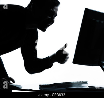 Un homme d'affaires caucasiennes computing ordinateur thumb up satisfait portrait silhouette en studio isolé sur fond blanc Banque D'Images