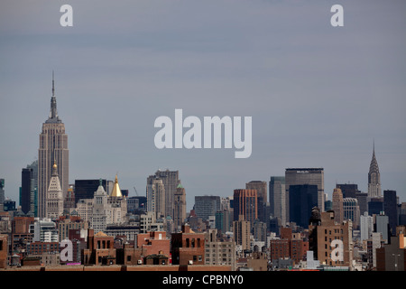 New York City Midtown skyline vue depuis le pont de Brooklyn, New York. Banque D'Images