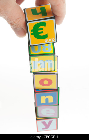 Toy building blocks spelling money concept Banque D'Images