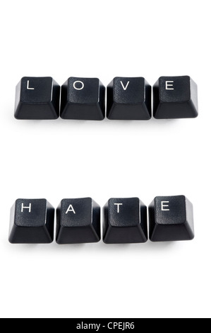 Les touches de l'ordinateur isolé sur blanc l'orthographe du mot amour et haine Banque D'Images