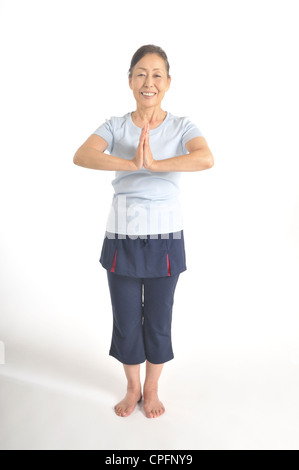 Senior woman doing exercise Banque D'Images
