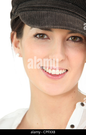 Jeune brunette wearing hat Banque D'Images