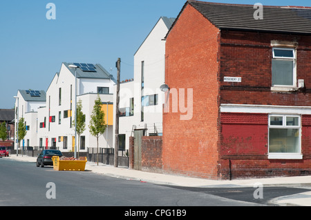 L'primé 'Infusion' développement de l'habitation, un mélange de nouvelle construction et rénové la propriété mitoyenne, Bowes salon Moss Side. Banque D'Images